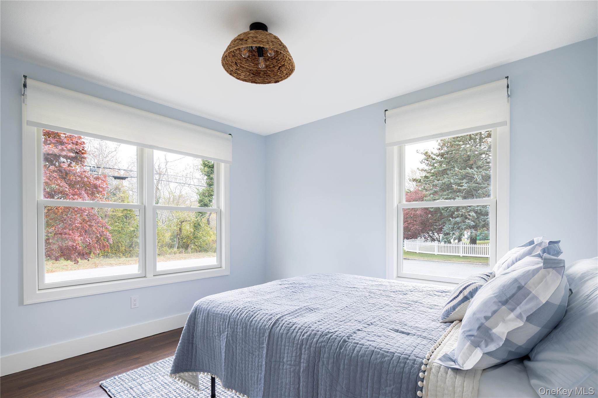 1995 Ruth Road Mattituck, NY 11952 - Photo 14 of 32 a bedroom with a large bed and a large window