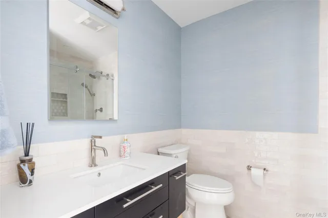 a bathroom with a sink and a toilet