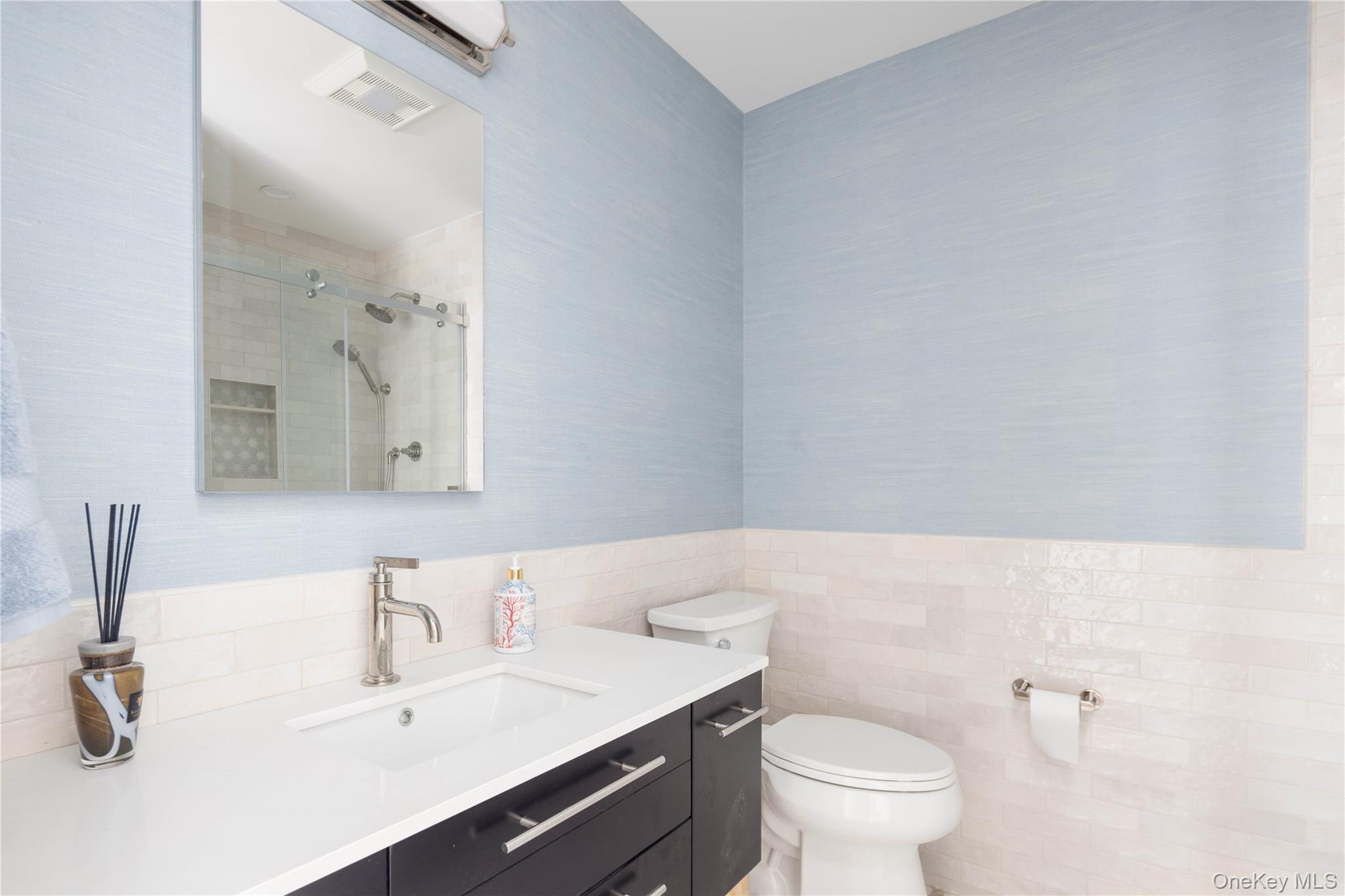 1995 Ruth Road Mattituck, NY 11952 - Photo 15 of 32 a bathroom with a sink and a toilet