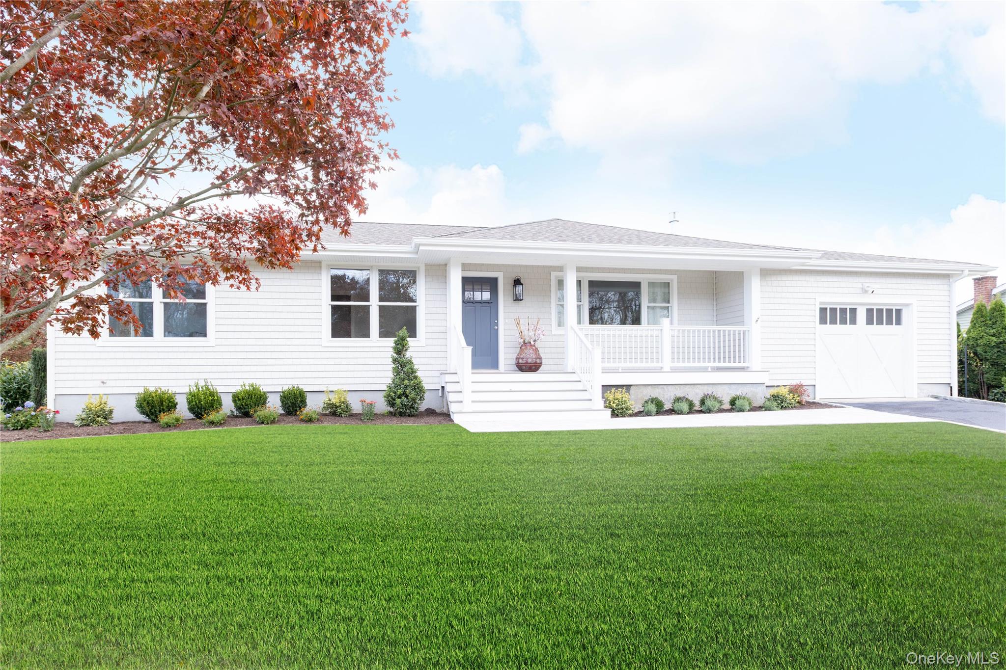 1995 Ruth Road Mattituck, NY 11952 - Photo 2 of 32 a view of a house with a yard