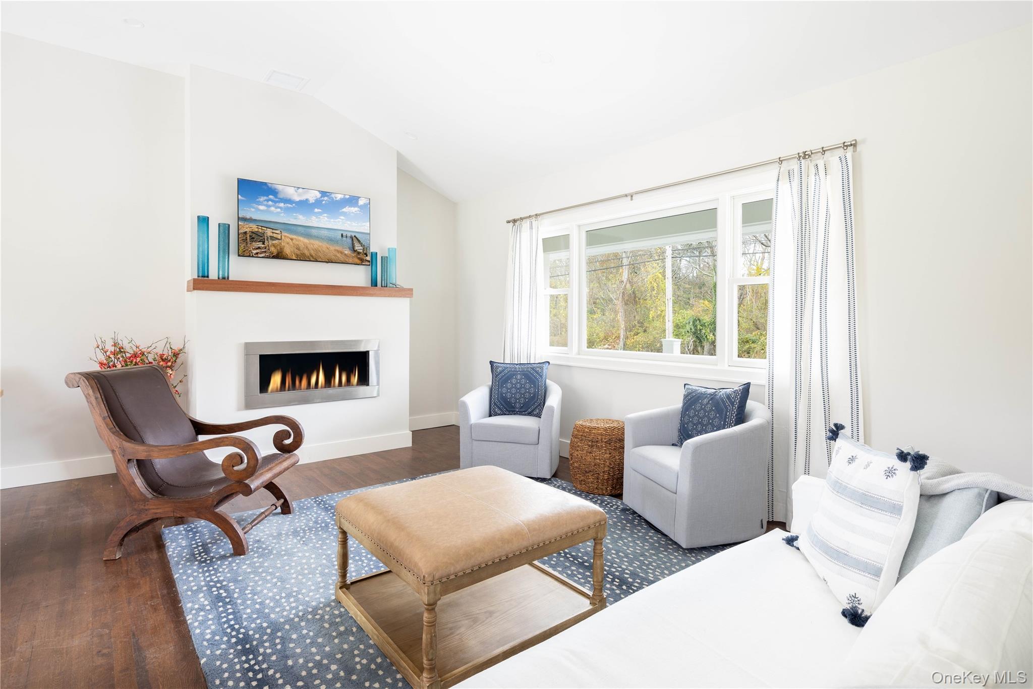 1995 Ruth Road Mattituck, NY 11952 - Photo 4 of 32 a living room with furniture and a fireplace