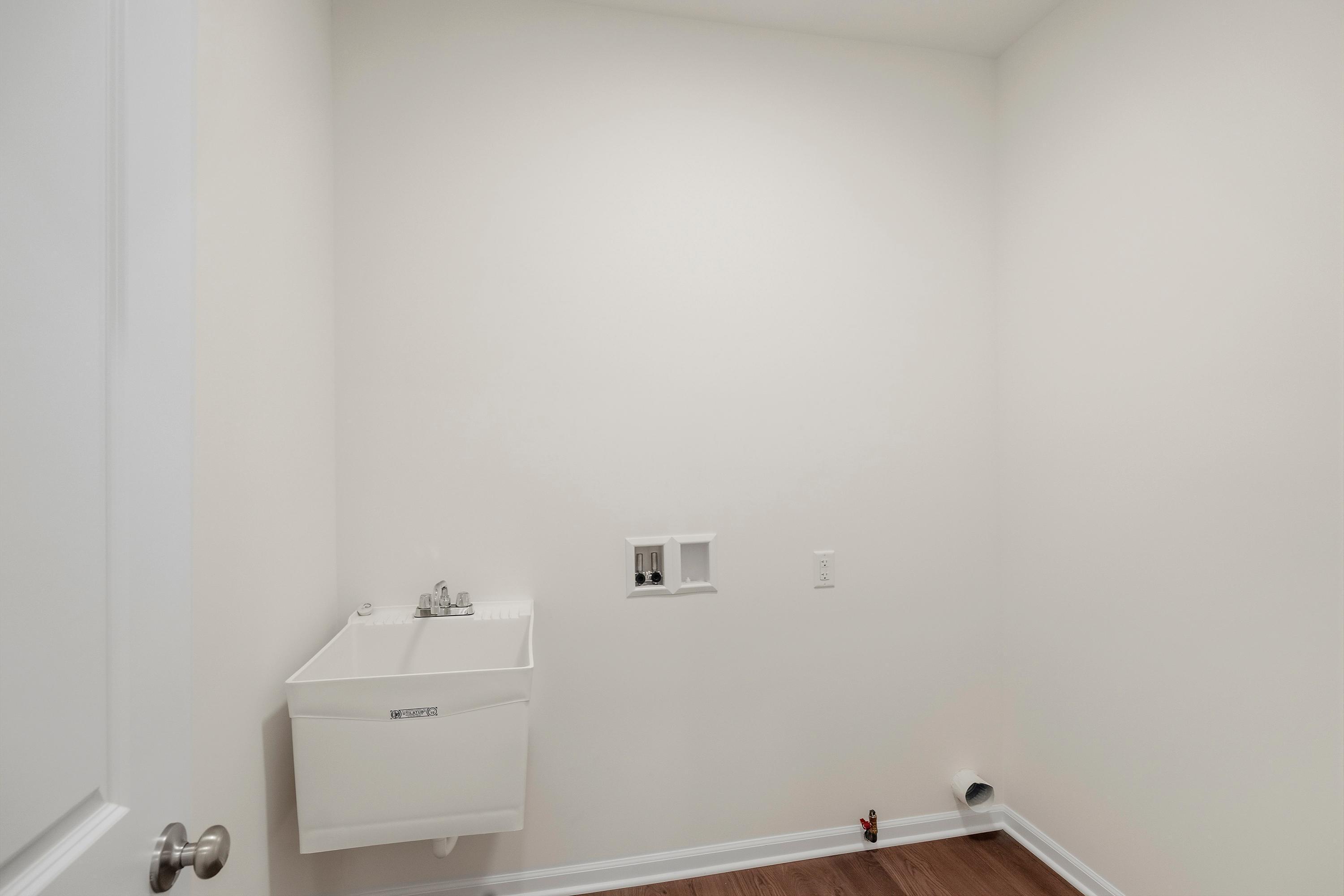 4053 Reflection Place Valparaiso, IN 46385 - Photo 18 of 18 a bathroom with a sink and cabinets