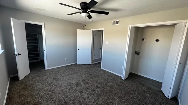 a bathroom with a bathtub and toilet