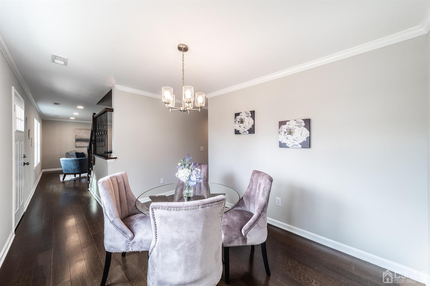 15 Dayton Road Edison, NJ 08817 - Photo 11 of 28 a view of a dining room with furniture and chandelier