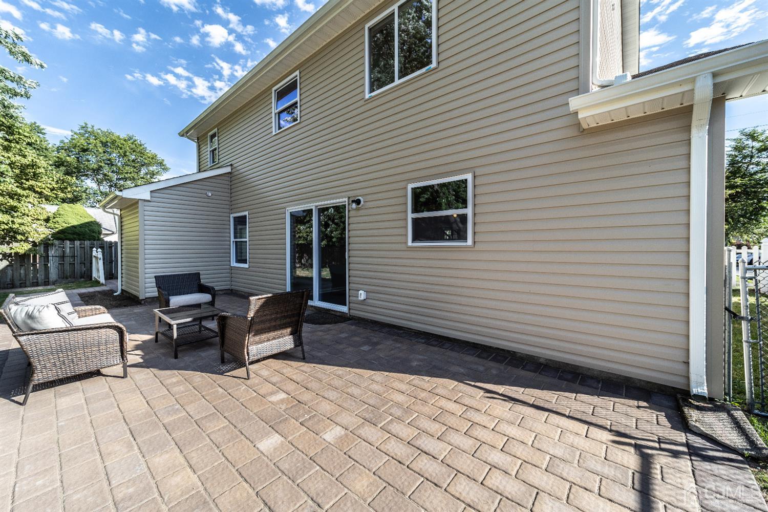 15 Dayton Road Edison, NJ 08817 - Photo 24 of 28 a backyard of a house with seating space