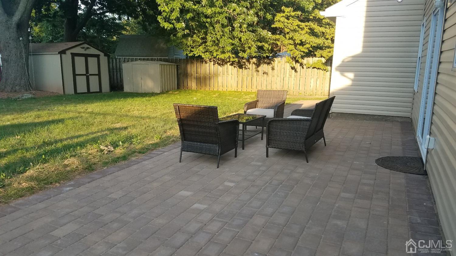 15 Dayton Road Edison, NJ 08817 - Photo 25 of 28 a view of a house with backyard and sitting area