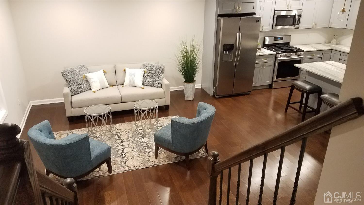 15 Dayton Road Edison, NJ 08817 - Photo 4 of 28 a living room with furniture and wooden floor