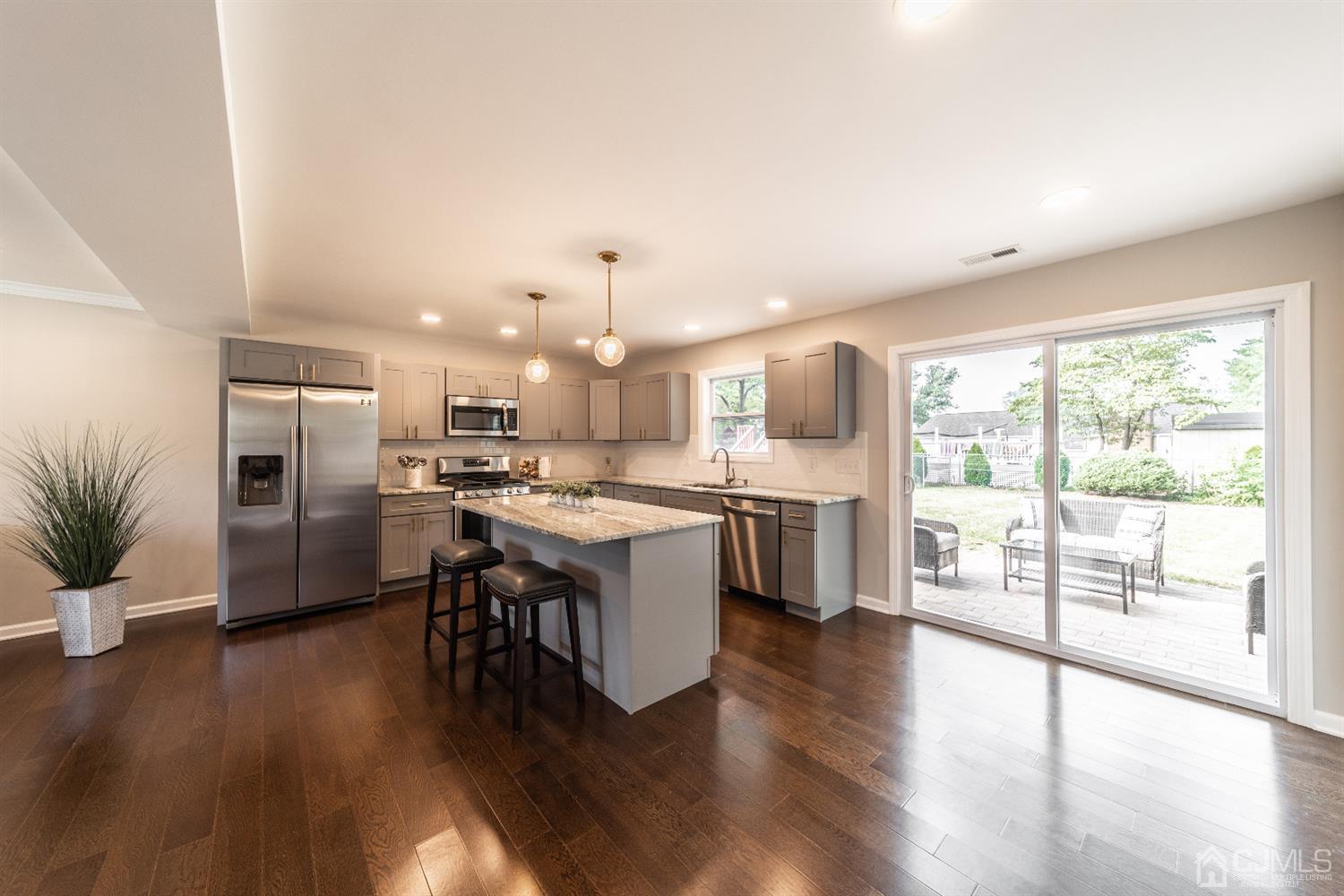15 Dayton Road Edison, NJ 08817 - Photo 6 of 28 a kitchen with a sink appliances and wooden floor