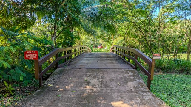 3610 Moloaa Road, Unit 2 Kilauea, HI 96754 - Photo 6 of 14 a view of stairs and flowers