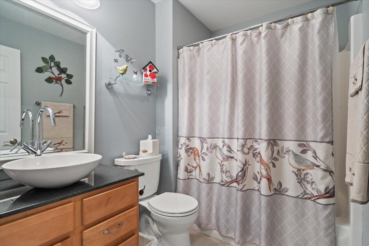 1270 East Greenview Place Crown Point, IN 46307 - Photo 23 of 44 a bathroom with a granite countertop sink and a mirror