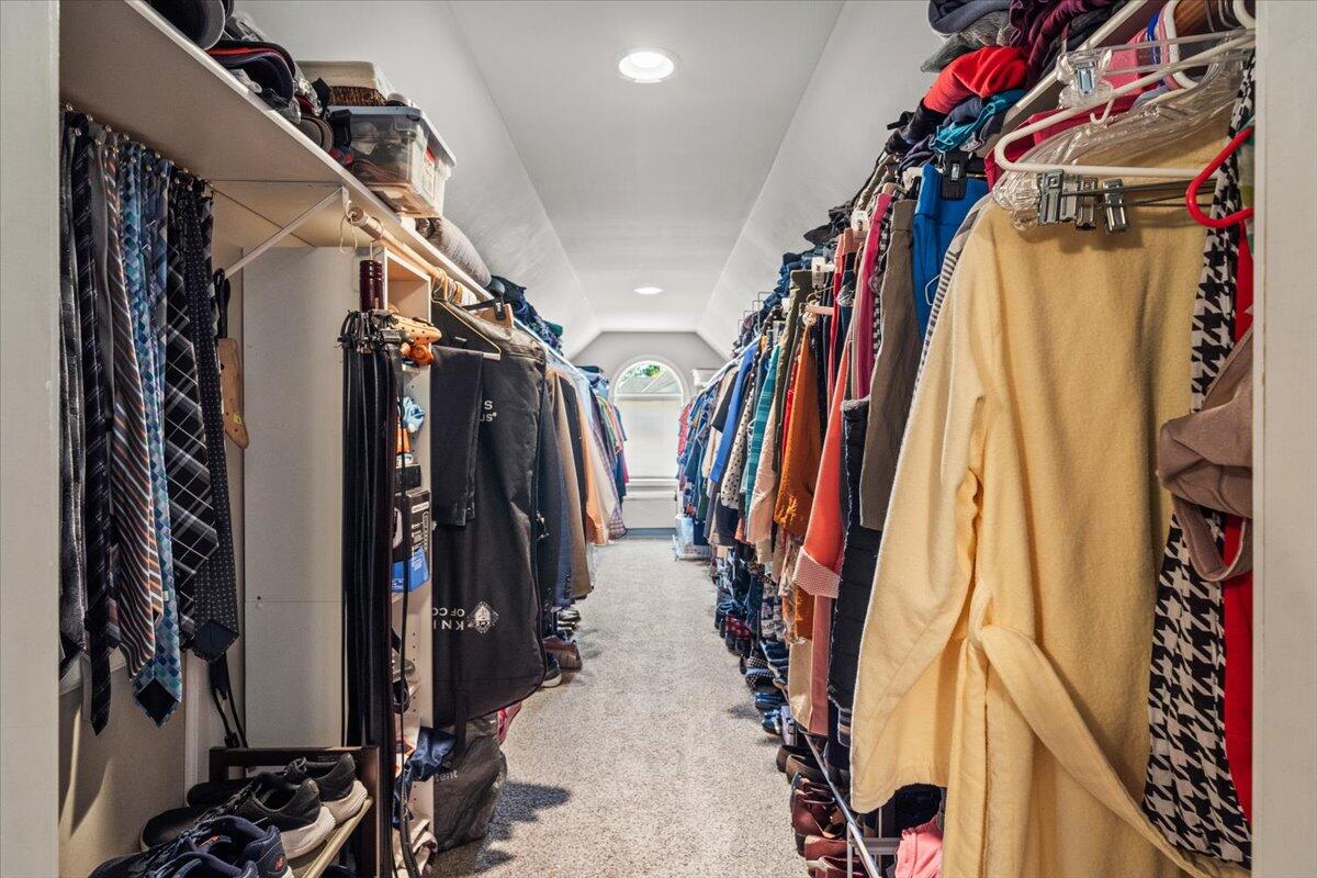 1270 East Greenview Place Crown Point, IN 46307 - Photo 31 of 44 a view of walk in closet with clothes