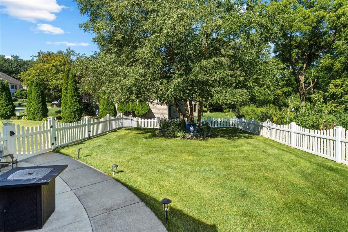 1270 East Greenview Place Crown Point, IN 46307 - Photo 42 of 44 a view of a garden with small trees