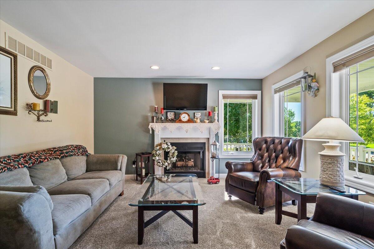 1270 East Greenview Place Crown Point, IN 46307 - Photo 6 of 44 a living room with furniture fireplace and window