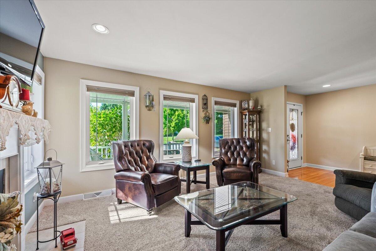 1270 East Greenview Place Crown Point, IN 46307 - Photo 7 of 44 a living room with furniture and a window