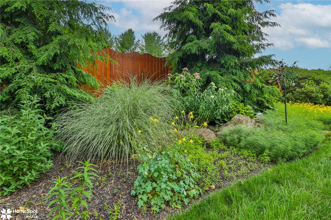 2821 Center Street Bethlehem, PA 18017 - Photo 60 of 68 Lush plantings and a natural privacy fence create a serene backyard retreat.
