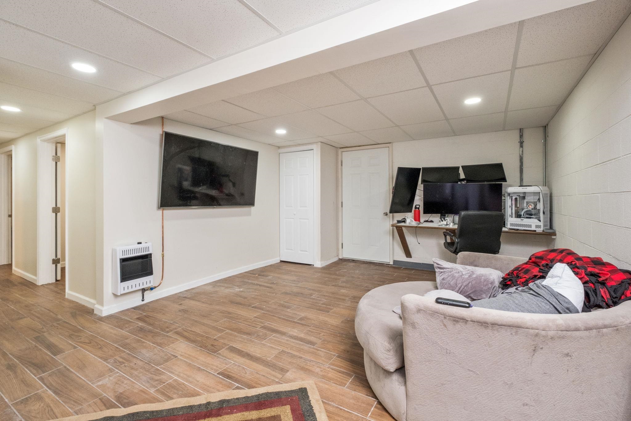 8208 George Wine Road Bridgewater, VA 22812 - Photo 16 of 27 a living room with furniture and a flat screen tv