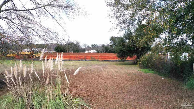 a view of swimming pool from a yard