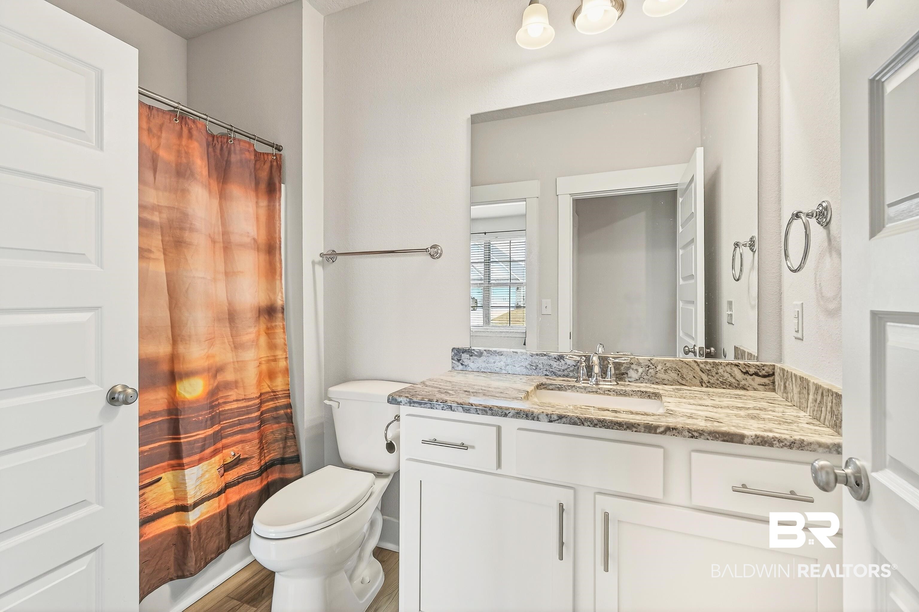 1728 Partridge Street Foley, AL 36535 - Photo 27 of 37 Bathroom with toilet and vanity