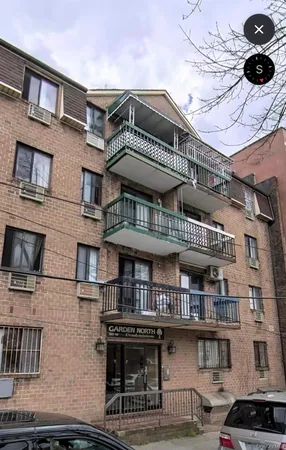 a front view of a building with balcony