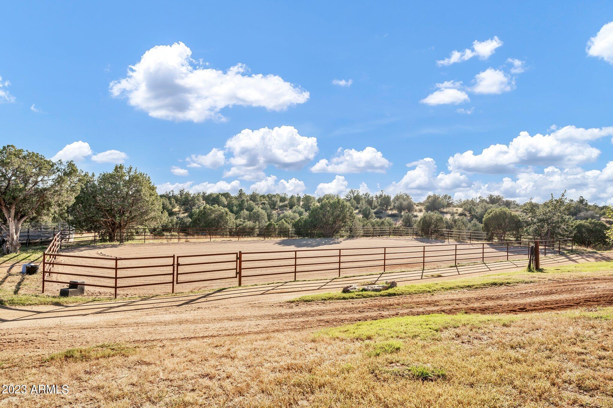 5801 Dillon Wash Road Prescott, AZ 86305 - Photo 108 of 169 103 - Warmup Arena outside Indoor Arena