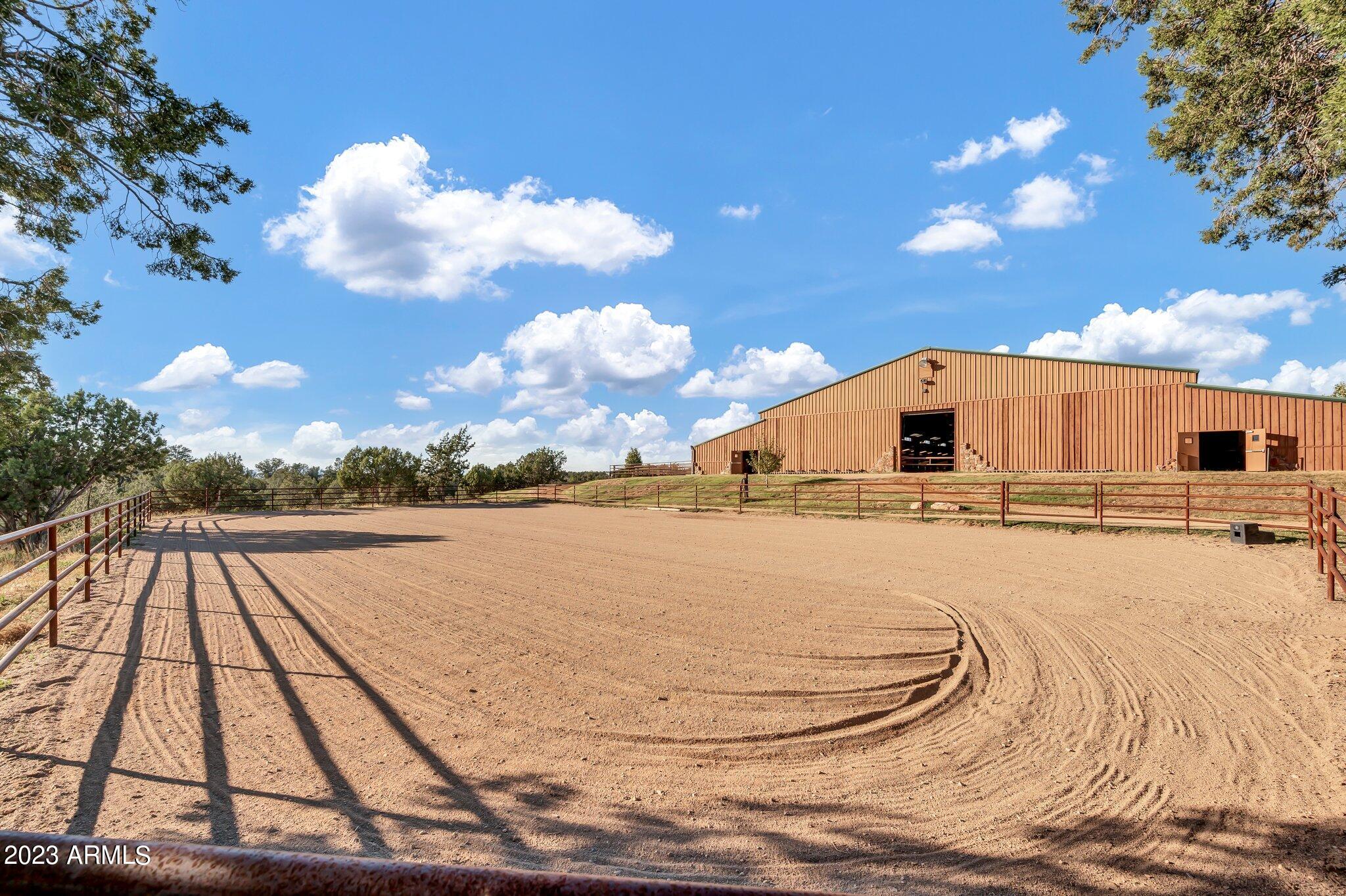 5801 Dillon Wash Road Prescott, AZ 86305 - Photo 110 of 169 105 - Warmup Arena Outside Indoor Arena