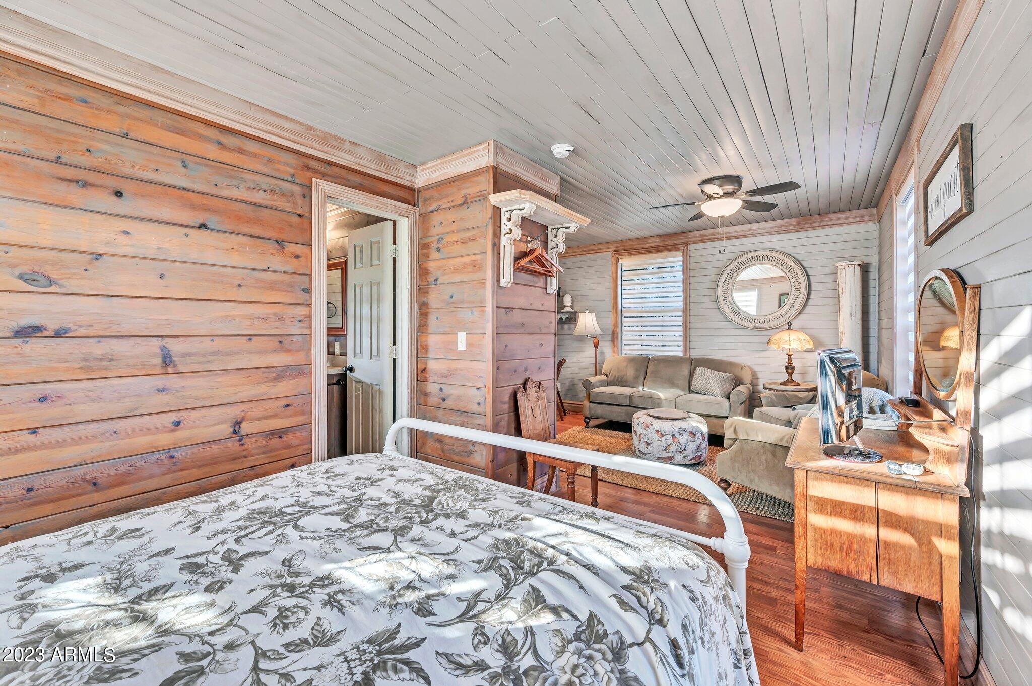 5801 Dillon Wash Road Prescott, AZ 86305 - Photo 146 of 169 141 - Cowboy House Bed and Living Room