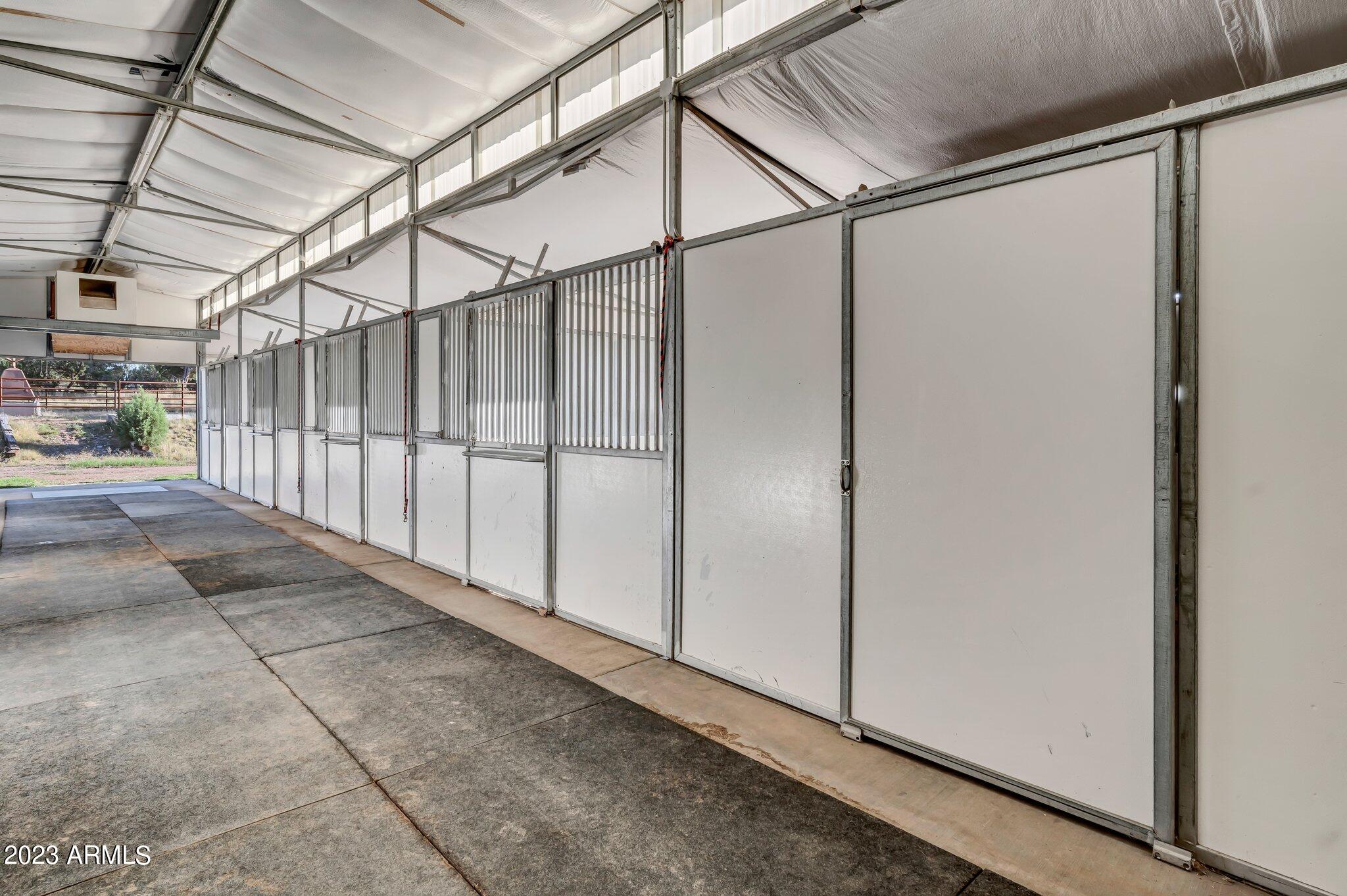 5801 Dillon Wash Road Prescott, AZ 86305 - Photo 154 of 169 149 - Lower Barn Stalls