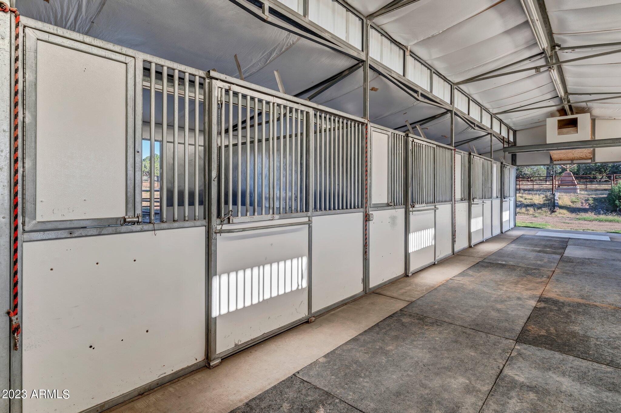 5801 Dillon Wash Road Prescott, AZ 86305 - Photo 155 of 169 150 - Lower Barn Stalls