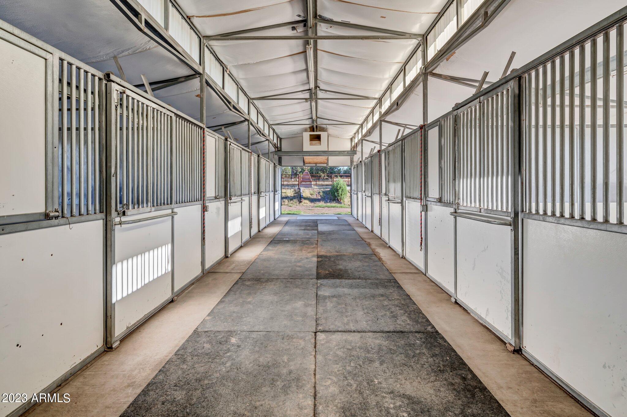 5801 Dillon Wash Road Prescott, AZ 86305 - Photo 156 of 169 151 - Lower Barn Stalls