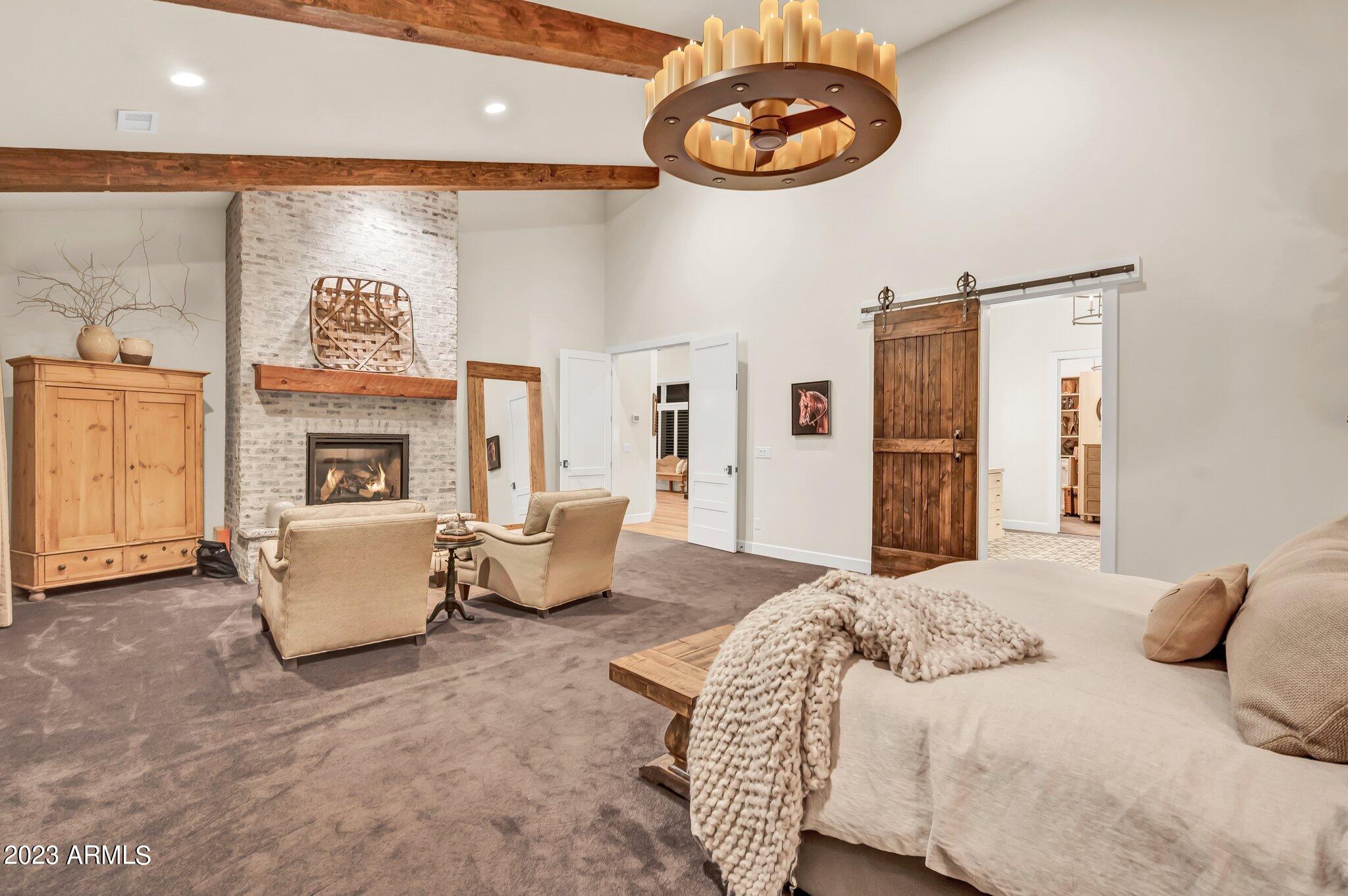 5801 Dillon Wash Road Prescott, AZ 86305 - Photo 41 of 169 36 - Main House Master Bedroom Fireplace