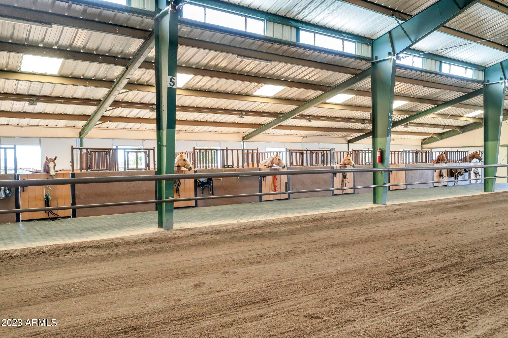 5801 Dillon Wash Road Prescott, AZ 86305 - Photo 98 of 169 93 - Indoor Arena Horse Stalls