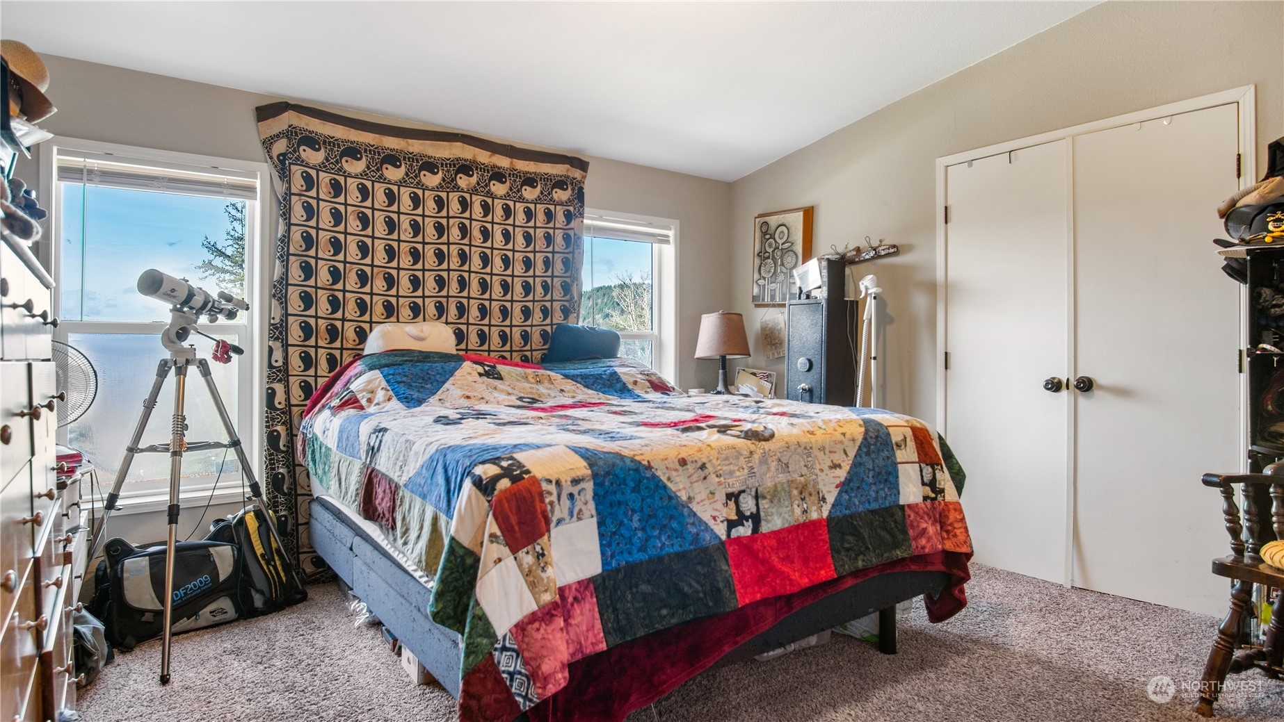 673 Curtis Hill Road, Unit G Chehalis, WA 98532 - Photo 14 of 25 a bedroom with a bed and a table