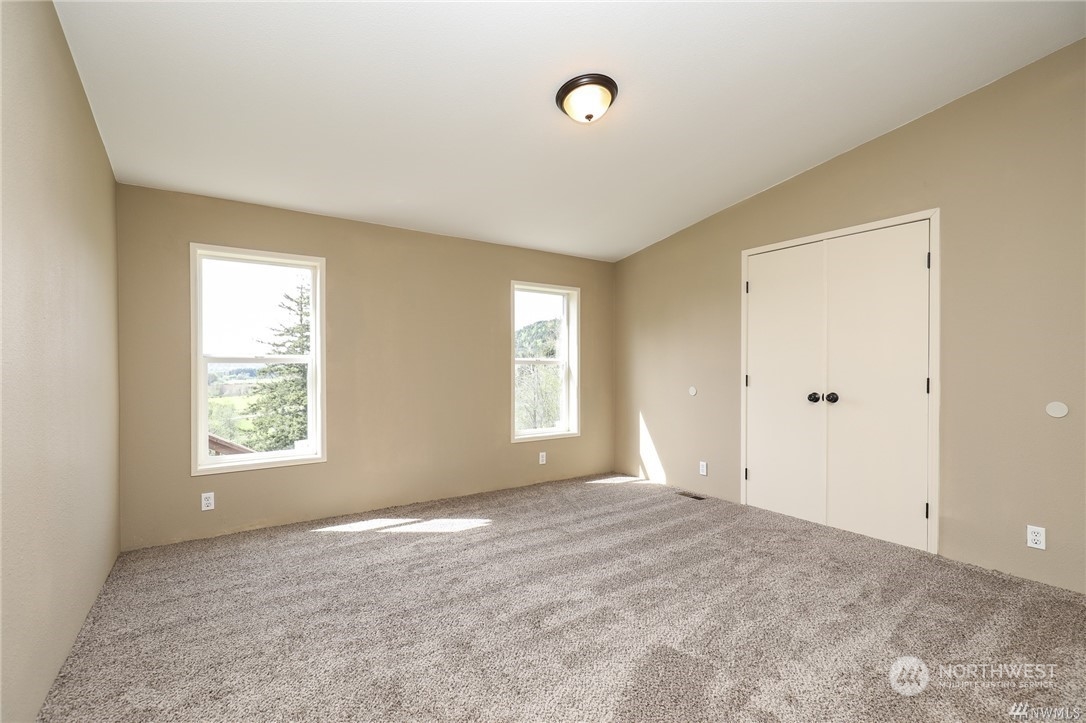 673 Curtis Hill Road, Unit G Chehalis, WA 98532 - Photo 15 of 25 a view of an empty room with a window