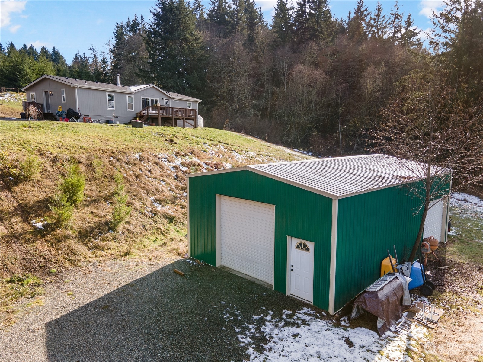 673 Curtis Hill Road, Unit G Chehalis, WA 98532 - Photo 21 of 25 a front view of a house with a yard