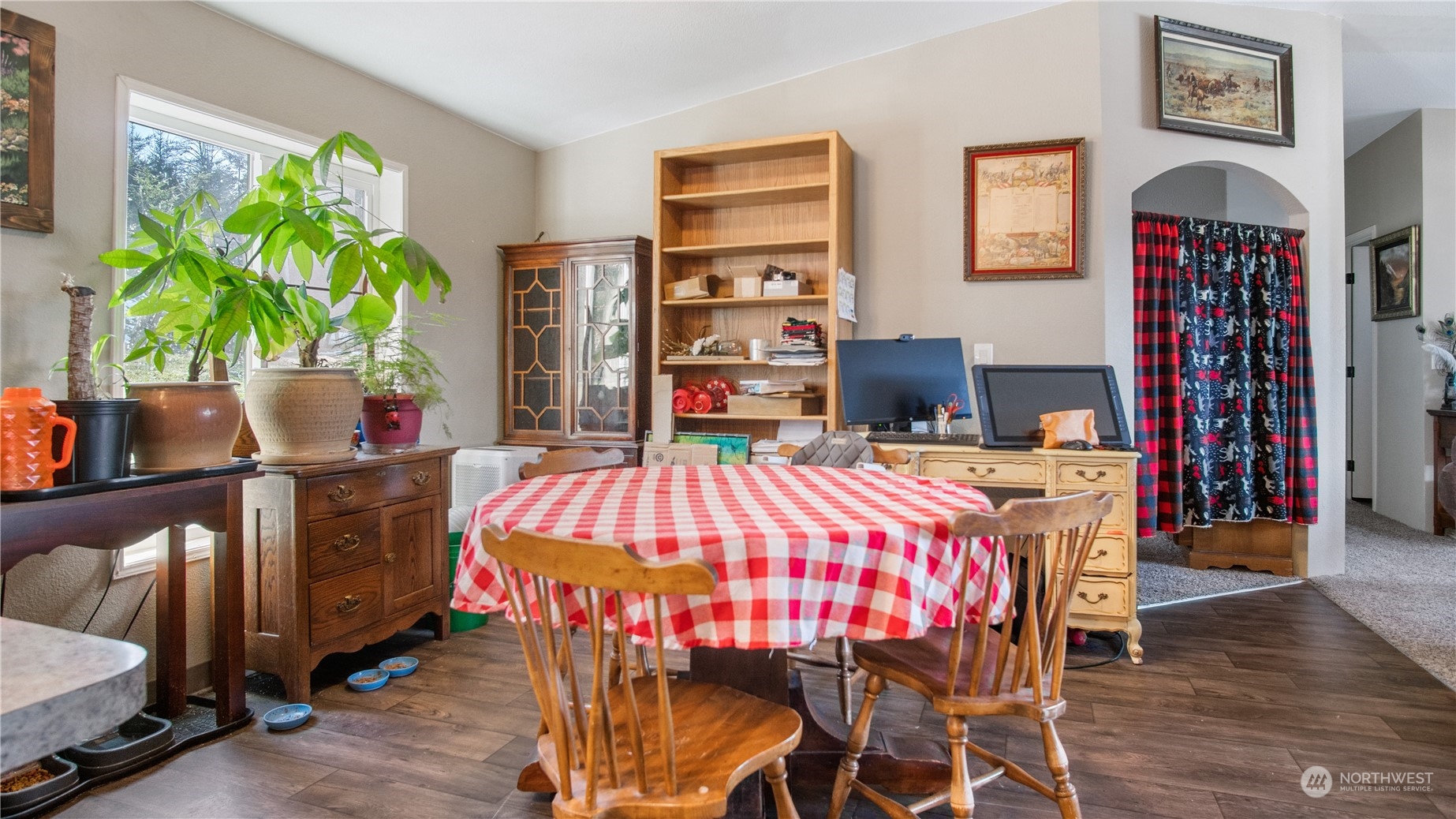 673 Curtis Hill Road, Unit G Chehalis, WA 98532 - Photo 8 of 25 a view of a dining room with furniture and a potted plant