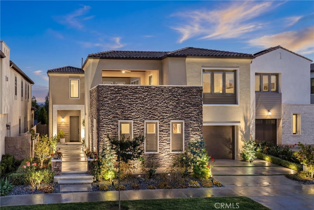 64 Bellatrix Irvine, CA 92618 - Photo 1 of 1 a front view of a house with garden