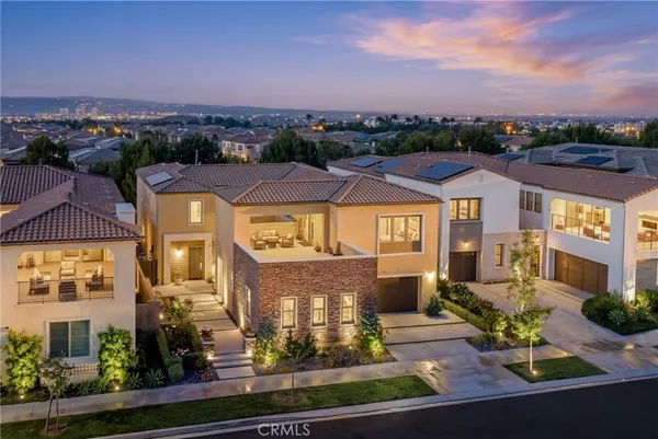 a view of a chairs and table in the patio