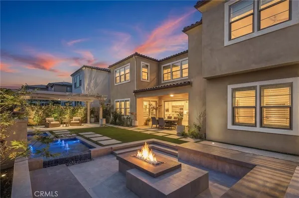 a backyard of a house with lake view