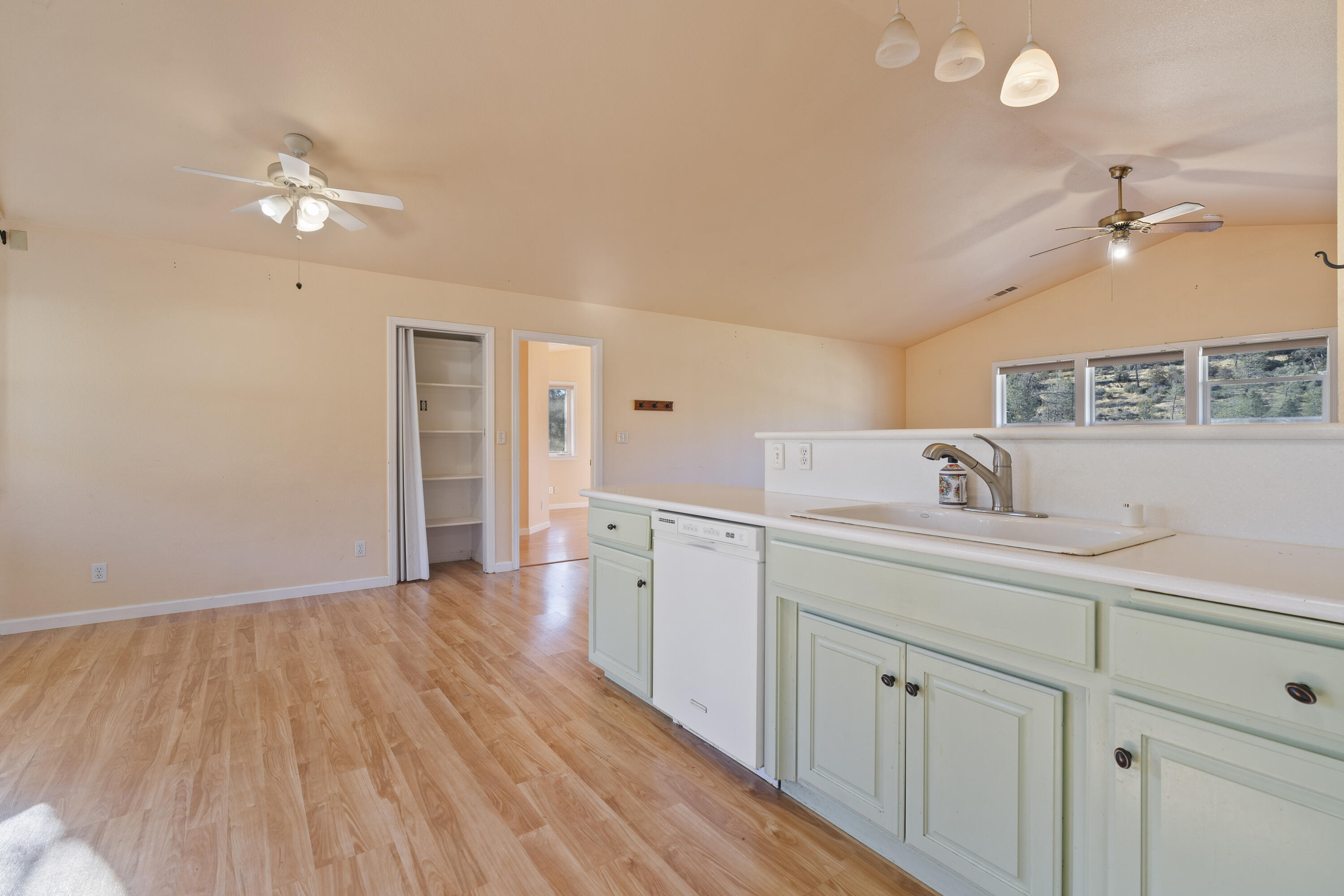 6841 Vista Lavega Road Shingletown, CA 96088 - Photo 15 of 80 a spacious bathroom with a granite countertop sink and a mirror