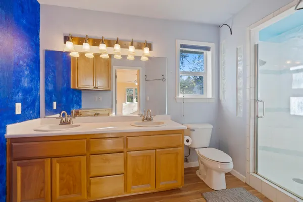 a view of a yard with mountains in the background