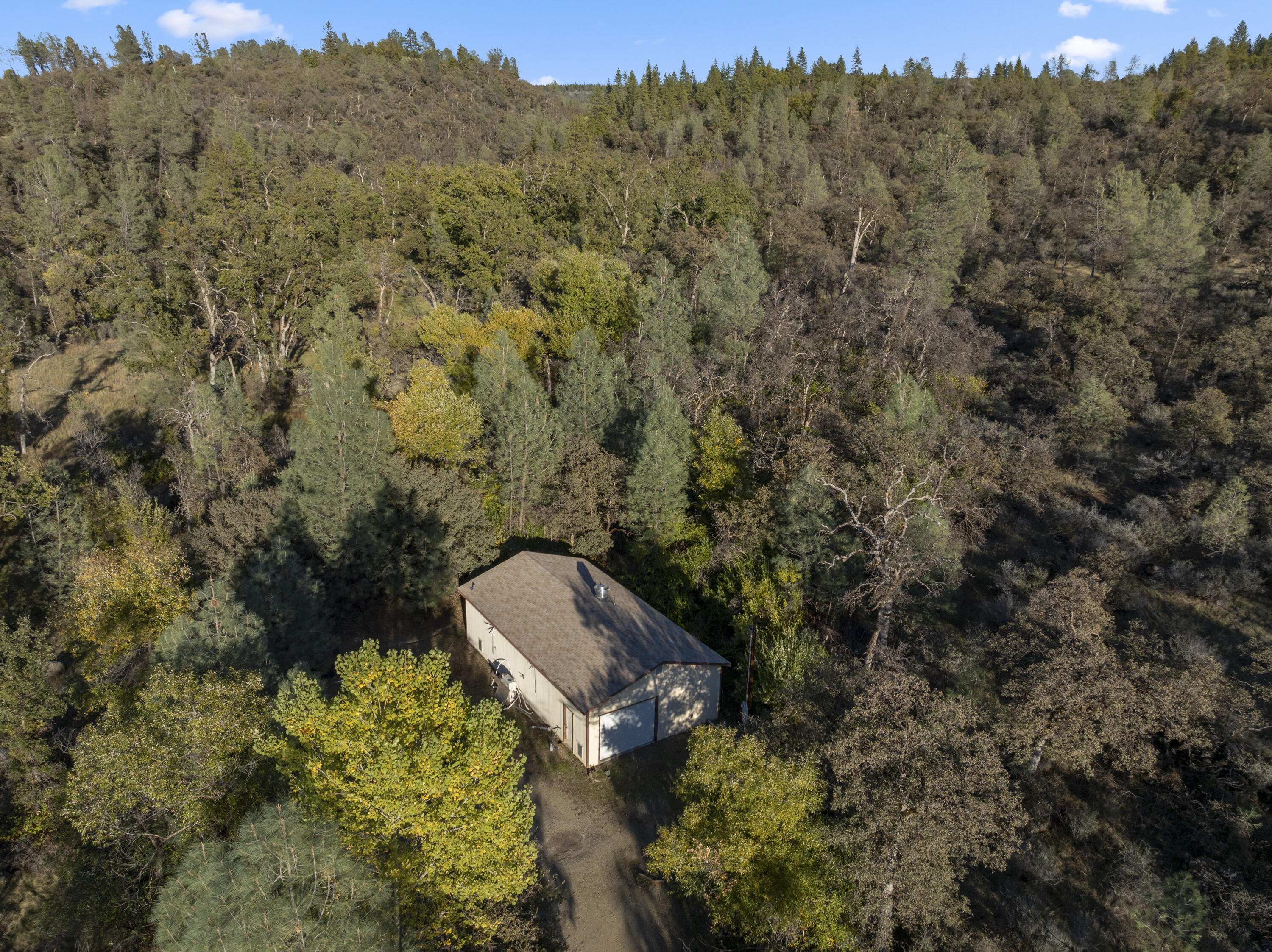6841 Vista Lavega Road Shingletown, CA 96088 - Photo 34 of 57 a aerial view of a house with a yard
