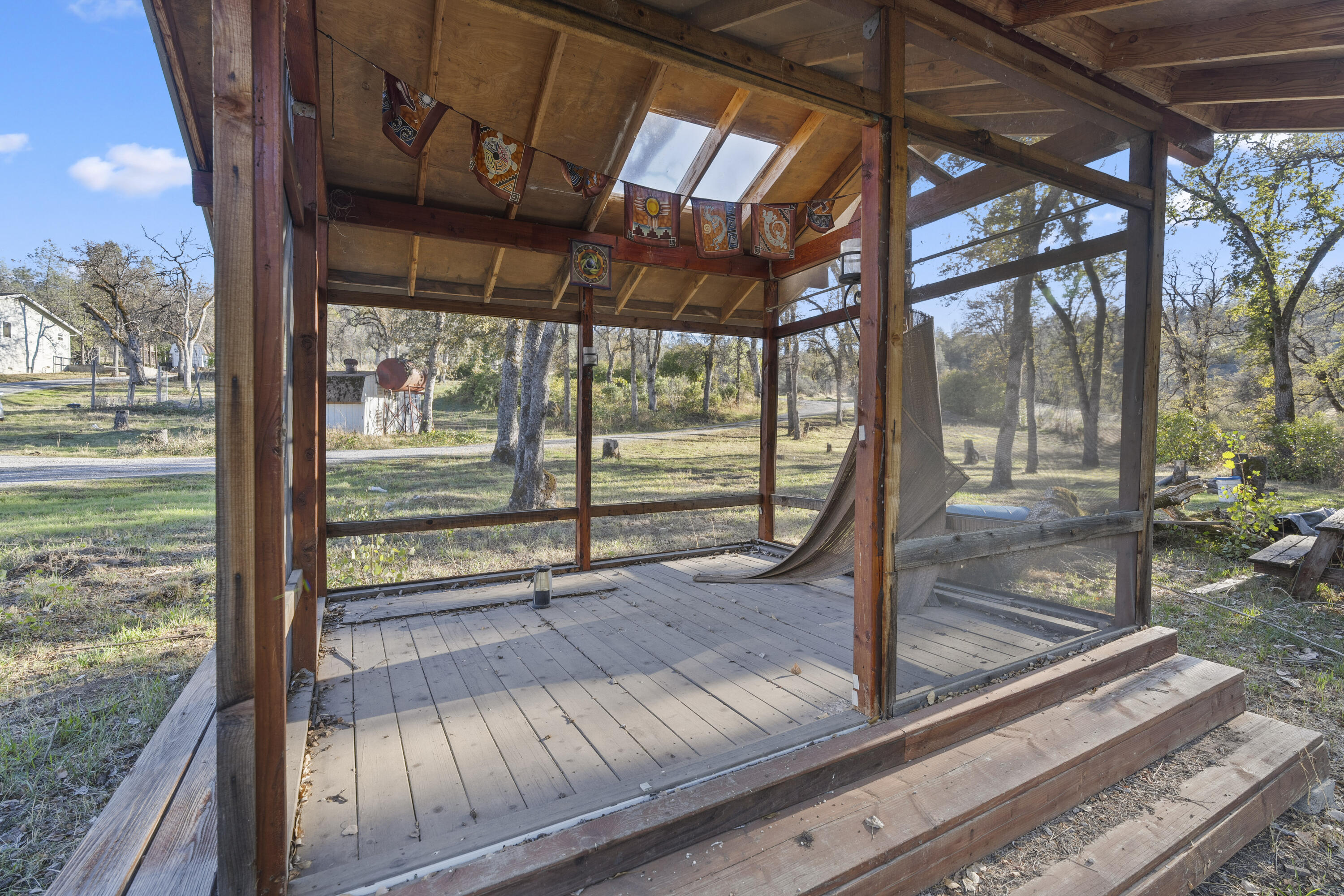 6841 Vista Lavega Road Shingletown, CA 96088 - Photo 55 of 57 a view of a porch with wooden floor