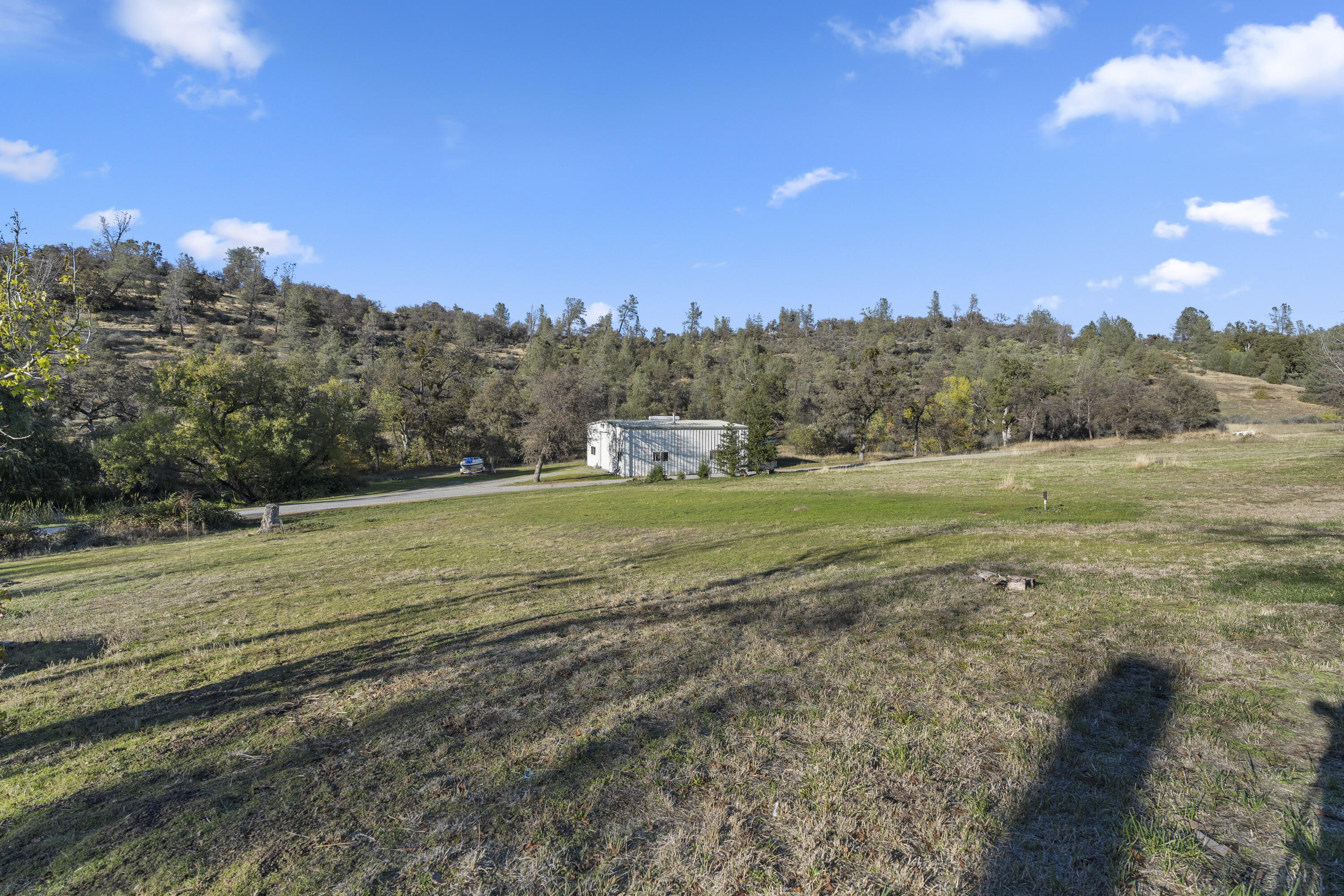 6841 Vista Lavega Road Shingletown, CA 96088 - Photo 56 of 57 a view of a field with trees in the background