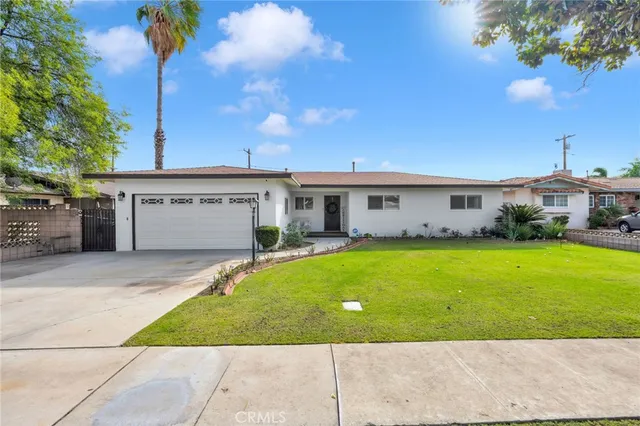 a view of a house with a swimming pool
