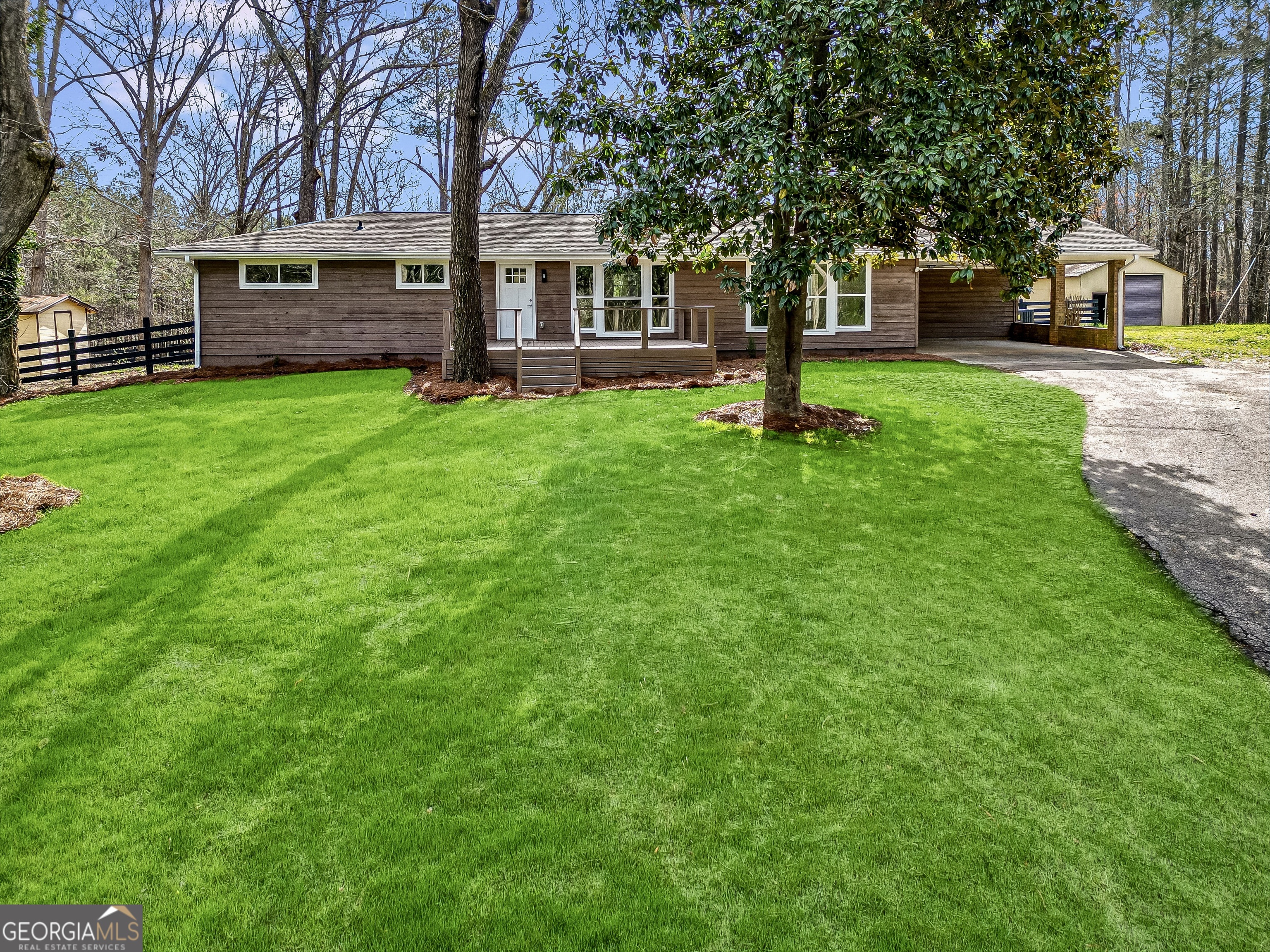 111 Fawn Road Jackson, GA 30233 - Photo 1 of 1 a view of a house with a yard and tree s