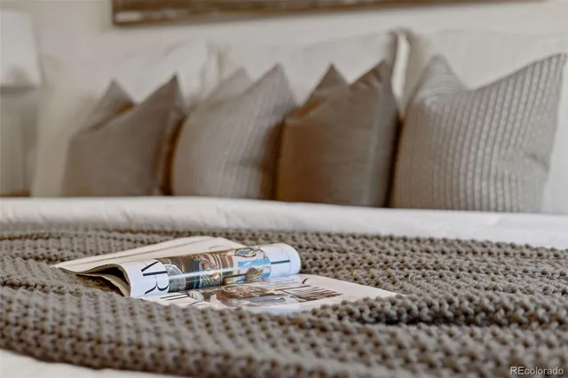 a view of a house with a yard and roof