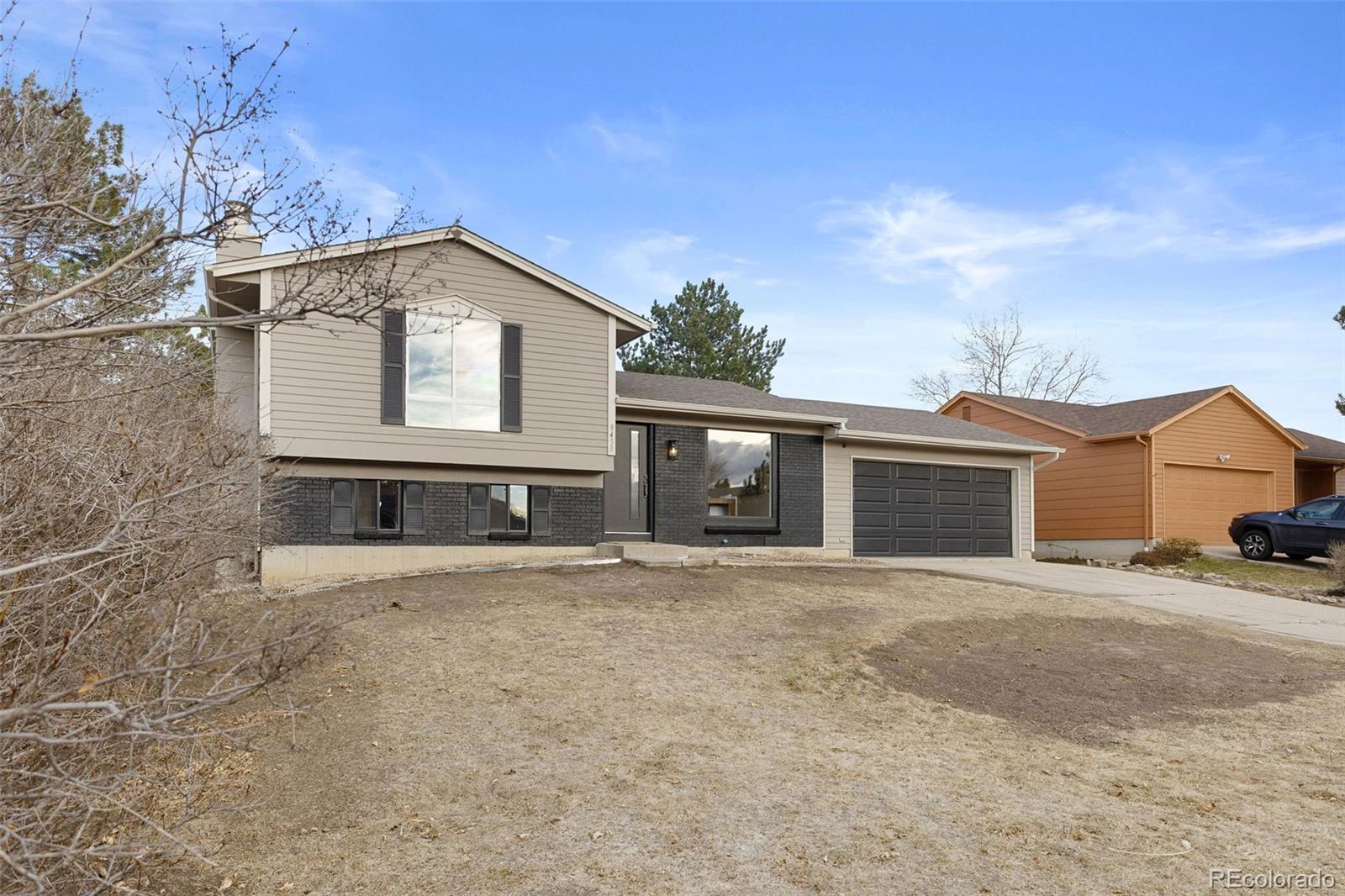 9458 Flower Street Broomfield, CO 80021 - Photo 2 of 30 front view of house