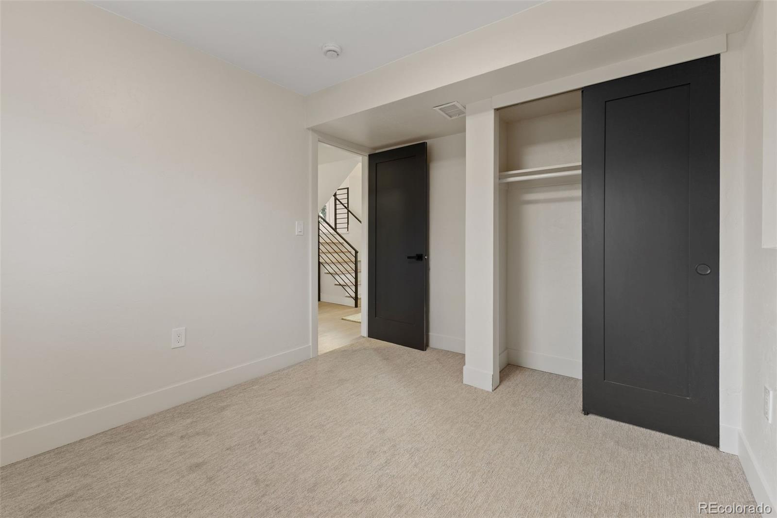 9458 Flower Street Broomfield, CO 80021 - Photo 24 of 30 a view of an empty room