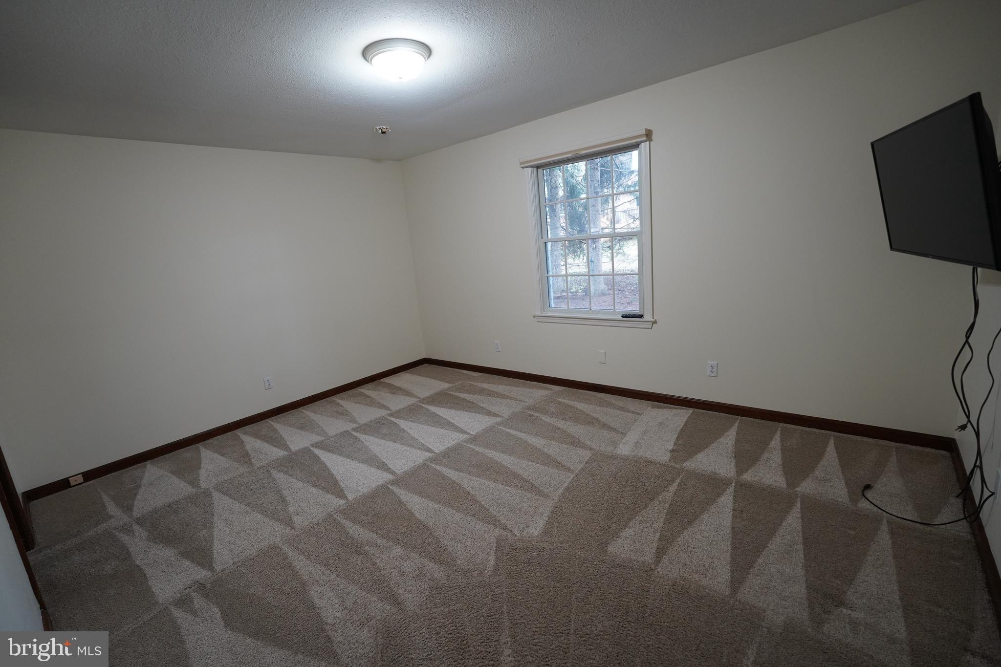 212 Seneca Circle State College, PA 16801 - Photo 12 of 67 a view of an empty room with a window
