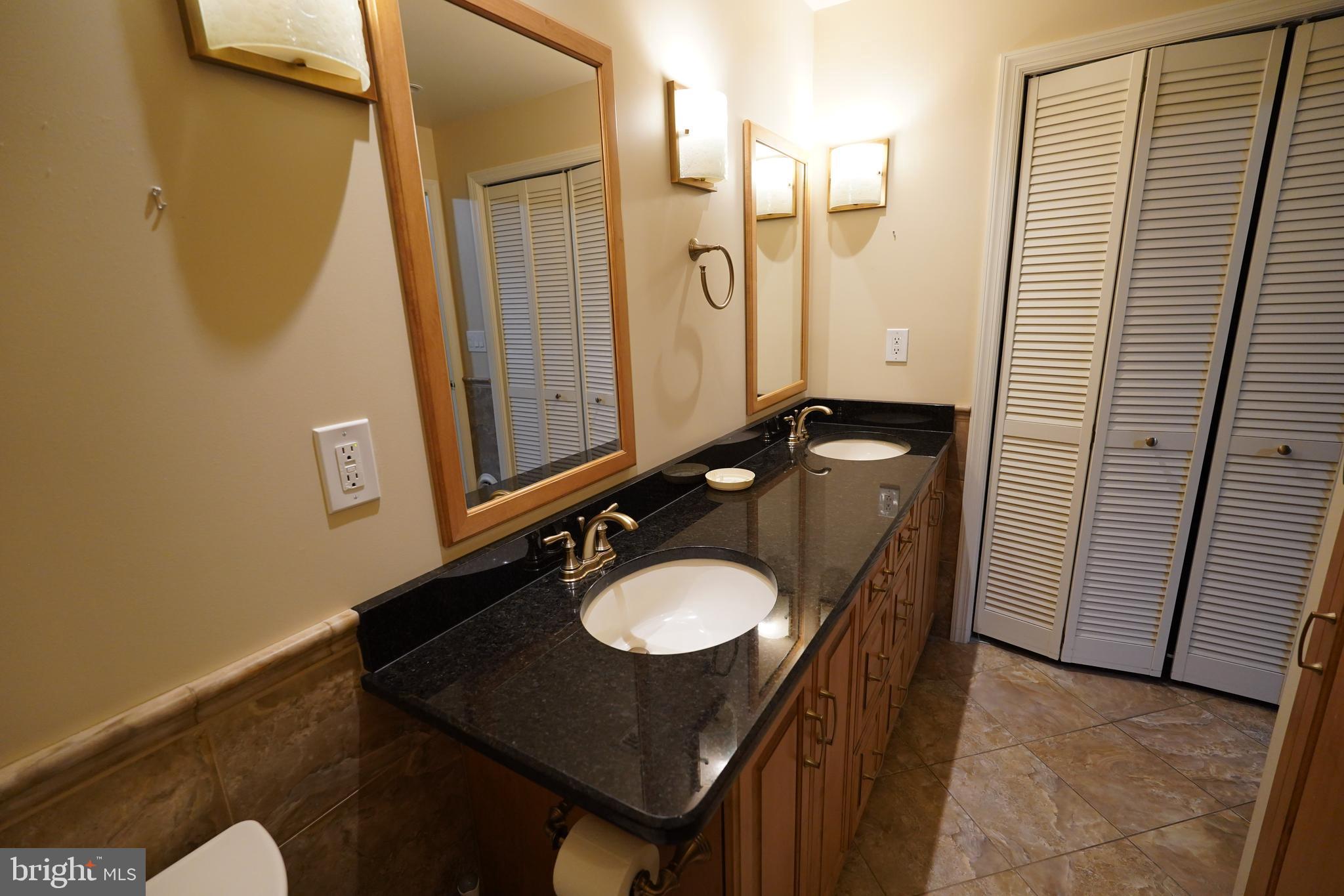 212 Seneca Circle State College, PA 16801 - Photo 14 of 67 a bathroom with a sink a mirror and a shower